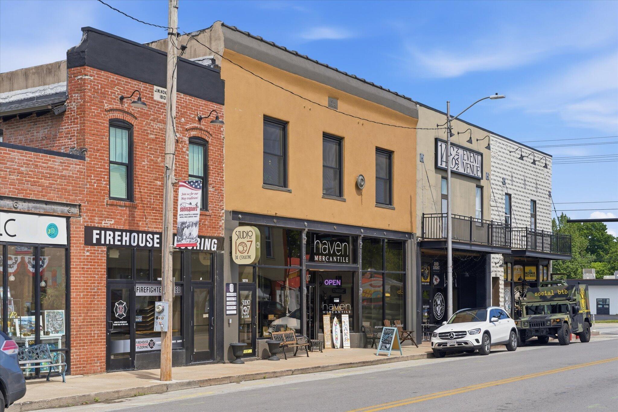 The Nixa Works building on South Main Street in downtown Nixa, with the mercantile storefront below